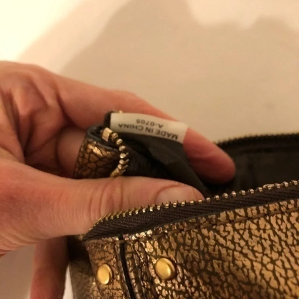 MICHAEL KORS wristlet mini bag studded metallic